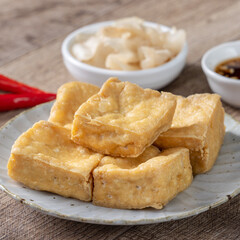 Deep fried stinky tofu with pickled cabbage street food in Taiwan.