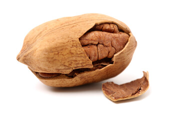 Peeled pecan nuts closeup, isolated on white background
