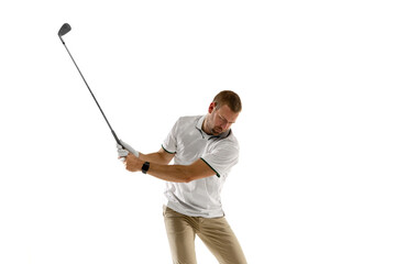 Half length. Golf player in a white shirt taking a swing isolated on white studio background with copyspace. Professional player practicing with bright emotions and facial expression. Sport concept.