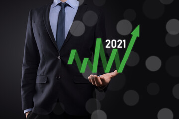 Plan business positive growth in year 2021 concept. Businessman plan and increase of positive indicators in his business, Growing up business concepts.