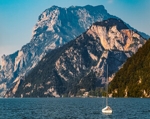 Beautiful alpine summer view with a boat and the Traunstein mountain in the background at the famous Ebensee, Salzkammergut, Upper Austria, Austria