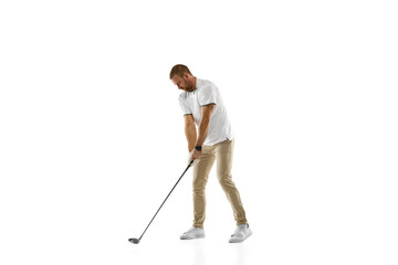 Checking. Golf player in a white shirt practicing, playing isolated on white studio background with copyspace. Professional player practicing with bright emotions and facial expression. Sport concept.