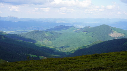 Naklejka premium landscape with clouds in carpatian mountains