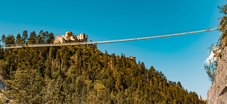 Beautiful alpine summer view with the famous highline179 and the castle ruins Ehrenberg near Reutte, Tyrol, Austria