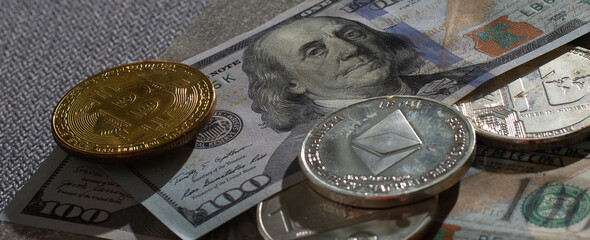 Bitcoin cryptocurrency and banknotes of one US dollar
