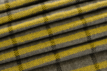 Woolen cloth, grey and yellow colors, pattern texture background