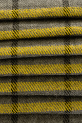 Woolen cloth, grey and yellow colors, pattern texture background