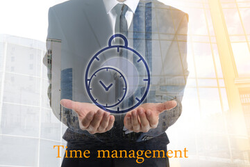 Double exposure of businessman with virtual clock and modern city. Time management concept
