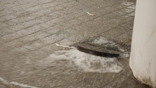Sewage overflow during rain top view