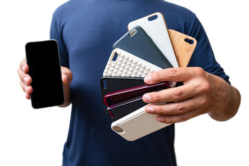 Man holding a choice of multicolored plastic back covers for mobile phone. Smart phone protector accessories. Isolated on white background.
