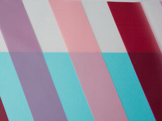 Multi-color background composition of cardboard of different colors postcard