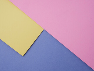 Multi-color background composition of cardboard of different colors postcard