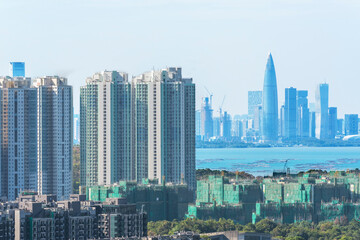 Fototapeta na wymiar Skyline of downtown of Shenzhen city in China and residential building in Hong Kong city