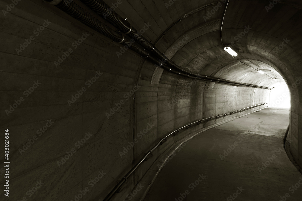 Aufkleber light at the end of stone tunnel