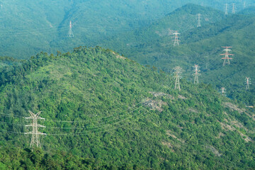 Electric pylon and electric line on mountain in Hong Kong