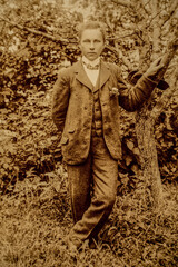 Germany - CIRCA 1910-20s: Rich man standing in garden. Vintage Carte de Viste Edwardian era male portrait photo