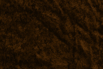 Brown velvet textured fabric material background