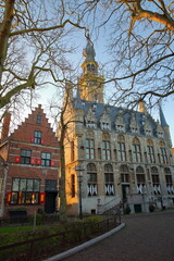 The gothic Stadhuis (town hall) with its impressive clock tower, located at the main square (Markt) in Veere, Zeeland, Netherlands