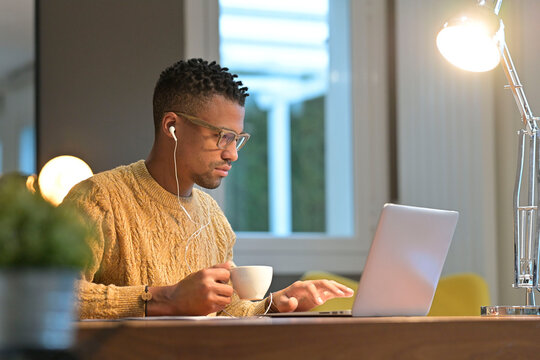 Portrait of african american trendy guy in a distant online call