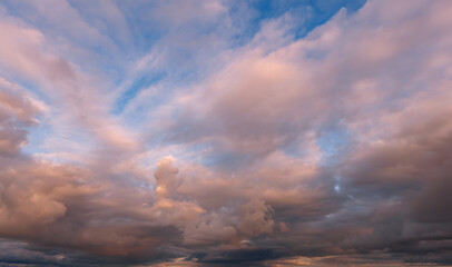 Amazing wallpaper of sky with clouds in sunset or sunrise time.
