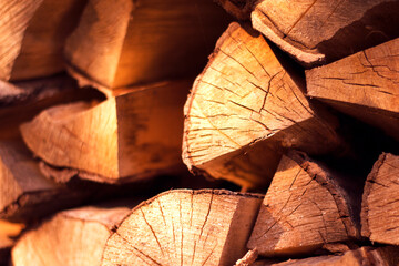 pile of firewood - warm close up, winter textured background