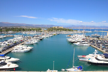 Fototapeta na wymiar Yachts in the port of Antibes, French Riviera