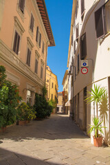 Fototapeta na wymiar A quiet residential backsteet in the town of Grosseto in Tuscany, Italy 