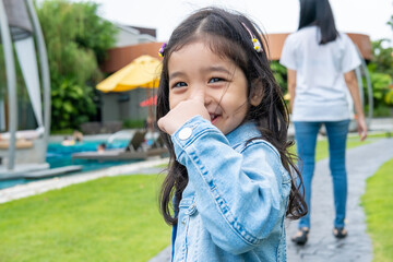 Little Child Girl Portrait at The Pool Villa