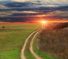 countryside road to sunset