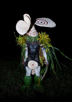 Dancer with a giant mask during a Baining tribe fire dance, East New Britain Province, Rabaul, Papua New Guinea