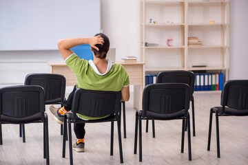 Fototapeta premium Young male student in business presentation concept