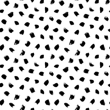 Big dots vector seamless pattern. Polka dot motif wallpaper. Abstract pattern of bold black shabby dots or spots on white background. Hand drawn black ornament for wallpaper, textile and fabric design