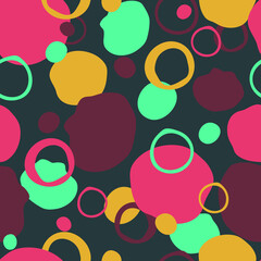 Seamless vector pattern with bright paint stains on grey background. Simple modern wallpaper design with colourful bubbles. Artistic fashion textile texture.