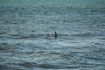 Surfer waiting for waves