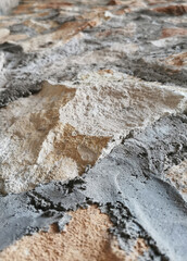 Old stone wall stone tunnel texture, background, blurred background, selective focus