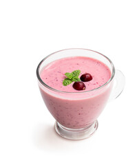 Pink smoothie with cranberry in glass cup on black stone background
