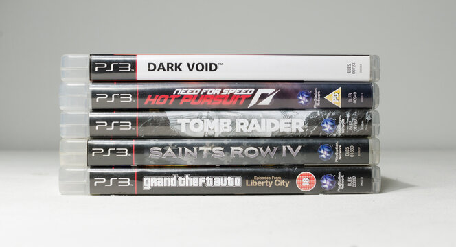 london, england, 08/05/2018 A large pile stack of used  playstation 3 video game cases and dvd games. sony ps3 home arcade system video games.