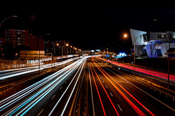 Fototapeta na wymiar Traffic lights at night in malaga. 