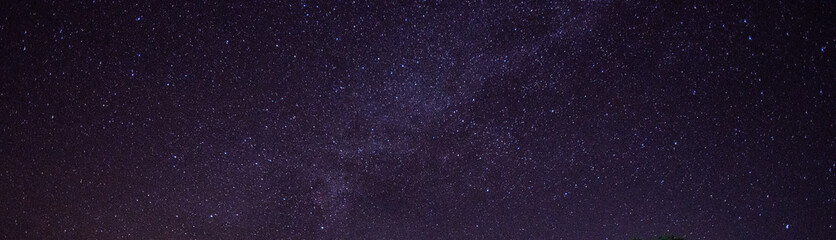 Fototapeta premium Amazing Panorama blue night sky milky way and star on dark background.