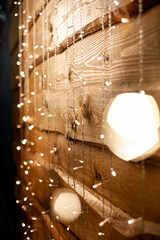 lamp on wooden wall