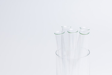 laboratory test tube glassware isolated over gray background. research minimal concept. copy space
