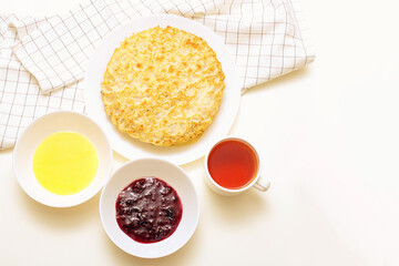 Obraz na płótnie Canvas Plate with pancakes, honey, jam. Russian traditional holiday Maslenitsa.