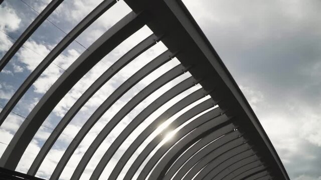 Undulate Wave Structure At The Henderson Waves In Singapore Against Bright Cloudy Sky - wide shot
