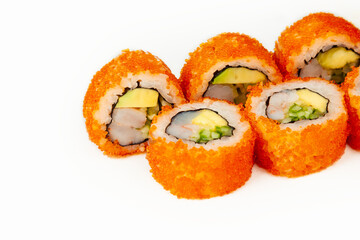 Sushi roll California roll on a white background, ingredients Shrimp, cucumber, avocado, flying fish roe, rice, nori. Traditional Japanese food. For the restaurant menu