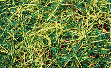 Blurred abstract background in vintage style. Gradient background in grunge style. Stripes of Christmas tinsel on a blurred background. Abstract background in neutral pink colors for your design