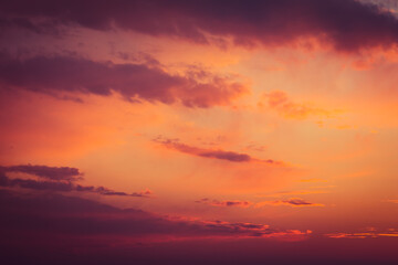 Beautiful colorful dramatic sky with clouds at sunset