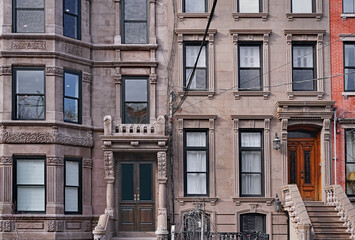 Fototapeta na wymiar facades of old brownstone style apartment buildings