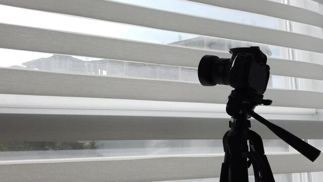 DSLR Camera on a Tripod Stock Footage