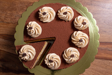 caramel toffee cake with cocoa and coffee beans