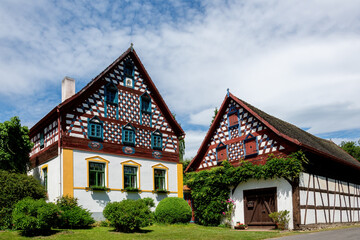 Fototapeta na wymiar Outdoor museum in Doubrava near historical city Cheb - folk architecture frame house - Czech Republic